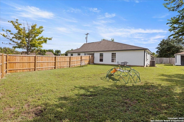 view of yard featuring central AC