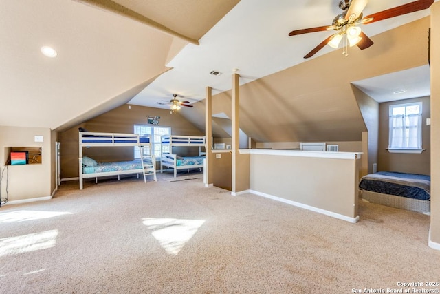 additional living space featuring carpet, plenty of natural light, and ceiling fan