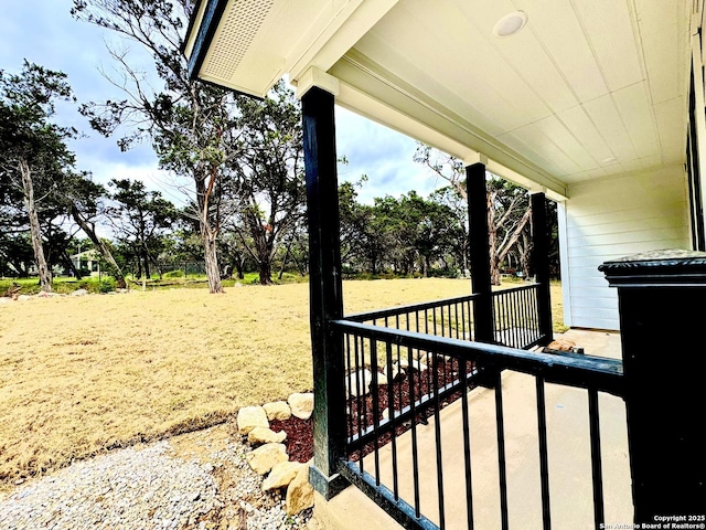 exterior space featuring a yard and a porch