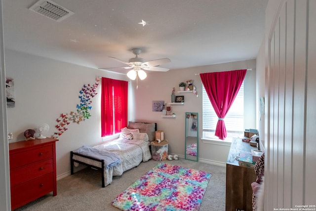 carpeted bedroom with ceiling fan