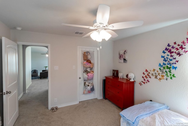 carpeted bedroom featuring ceiling fan