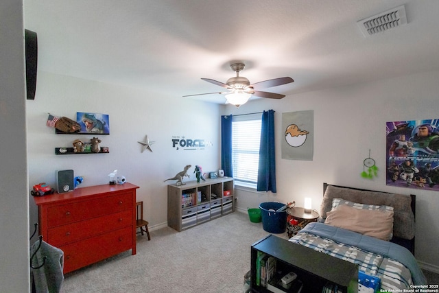 carpeted bedroom featuring ceiling fan