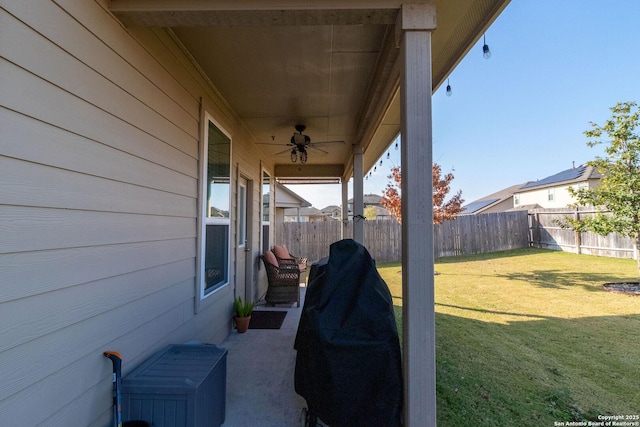 view of patio / terrace featuring ceiling fan