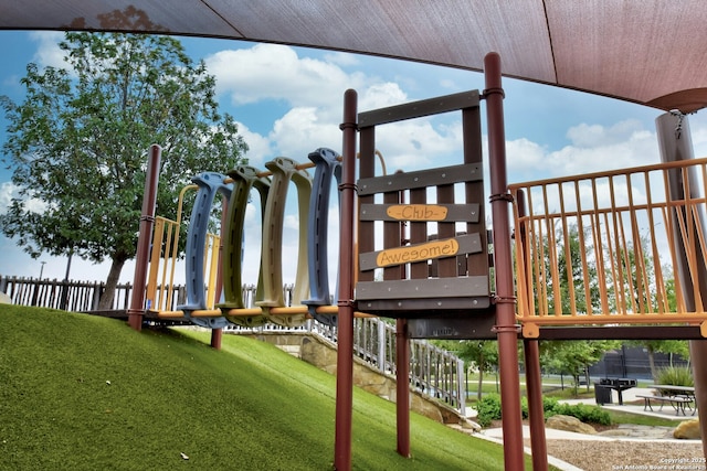 view of jungle gym featuring a yard