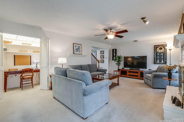 living room with ceiling fan