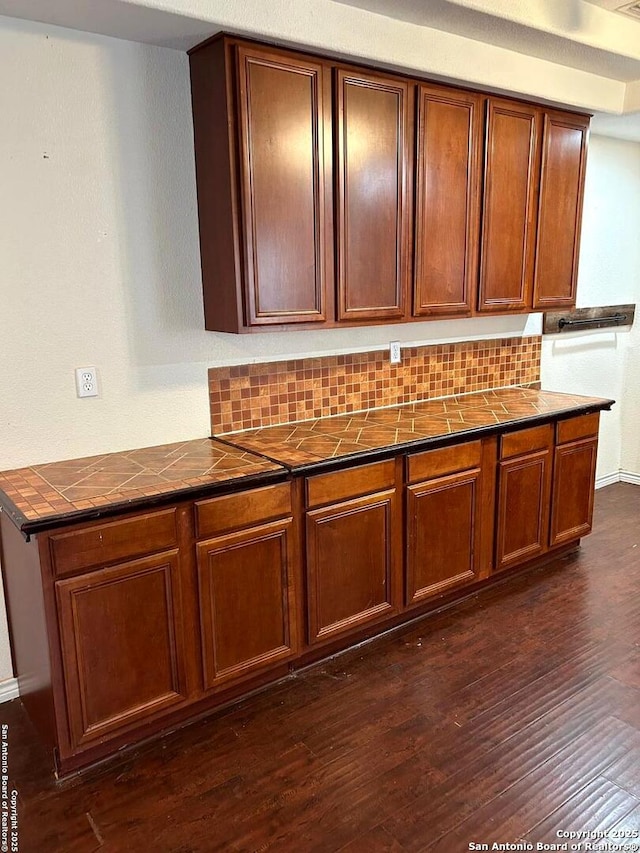 kitchen featuring dark wood-type flooring