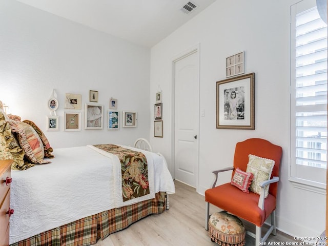 bedroom featuring light wood-type flooring