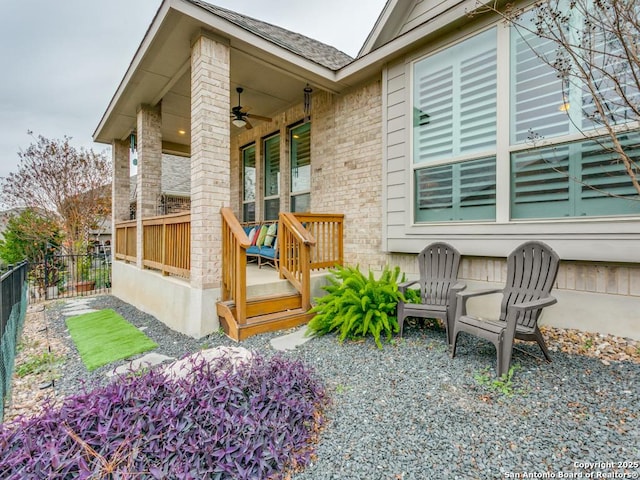 back of house featuring ceiling fan