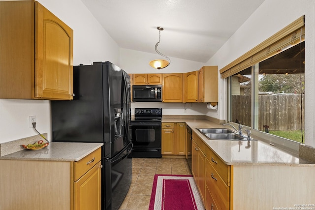 kitchen featuring pendant lighting, black appliances, sink, vaulted ceiling, and light tile patterned floors