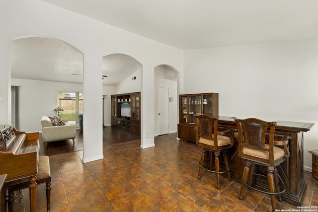 dining space with indoor bar