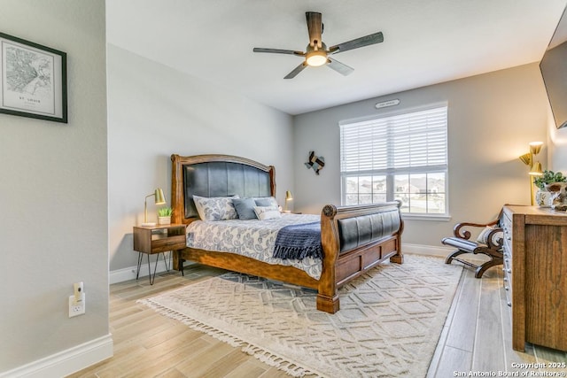 bedroom featuring ceiling fan and light wood-type flooring