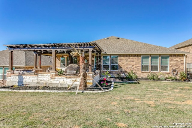 rear view of house featuring a lawn, a pergola, and a patio