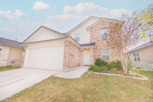 view of front of home with a garage, a front yard, and central AC