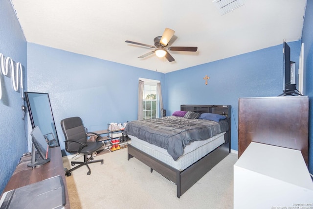 carpeted bedroom featuring ceiling fan