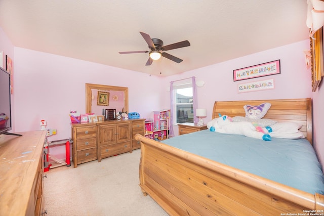 bedroom featuring light carpet and ceiling fan