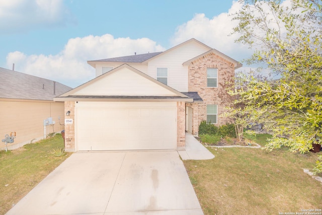 view of front property with a front yard and a garage