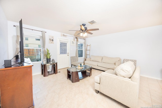 living room featuring ceiling fan