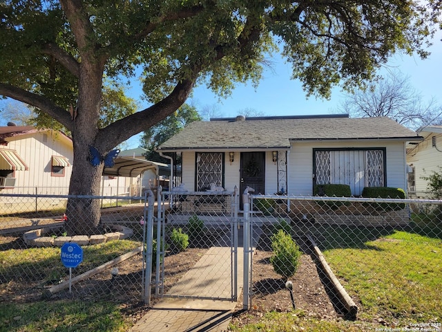 ranch-style home featuring a front yard