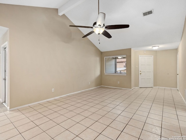 unfurnished room with lofted ceiling with beams, ceiling fan, and light tile patterned floors