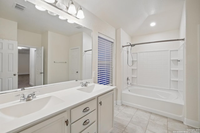 bathroom featuring tile patterned floors, vanity, and shower / bath combination