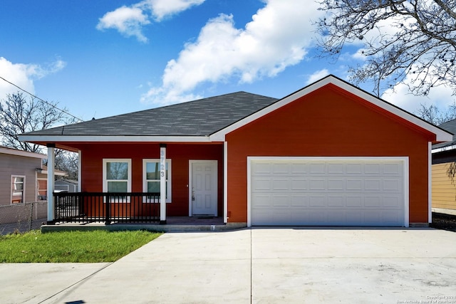 ranch-style house featuring a porch and a garage