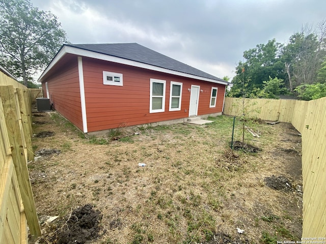 view of side of property featuring cooling unit