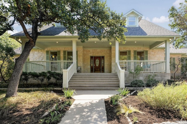 view of front of home featuring covered porch