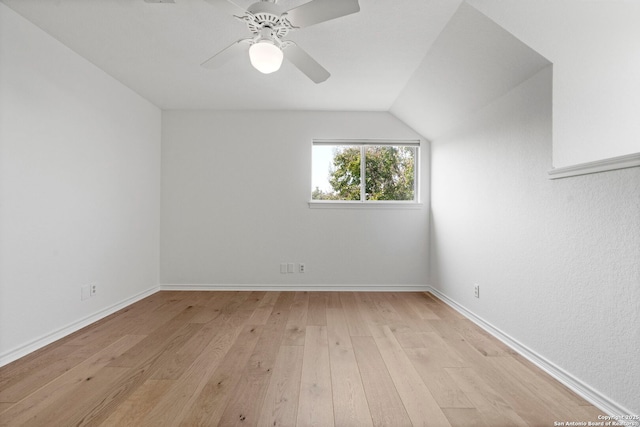 bonus room with light hardwood / wood-style flooring, vaulted ceiling, and ceiling fan