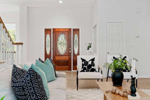 foyer entrance with light hardwood / wood-style floors