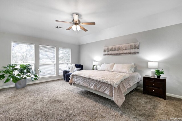 bedroom with dark colored carpet and ceiling fan