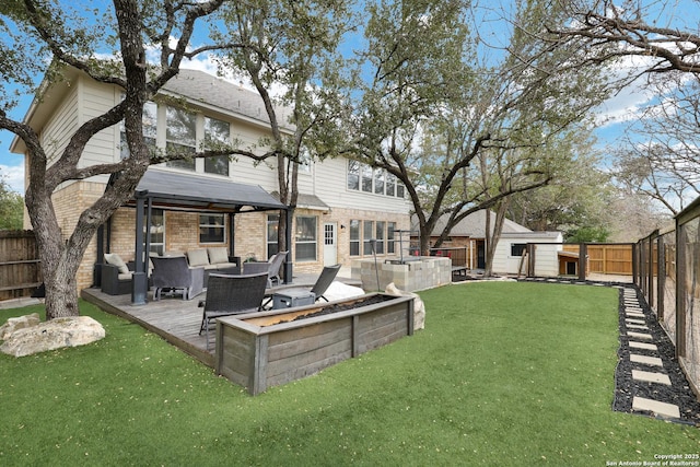 view of yard featuring outdoor lounge area and a wooden deck