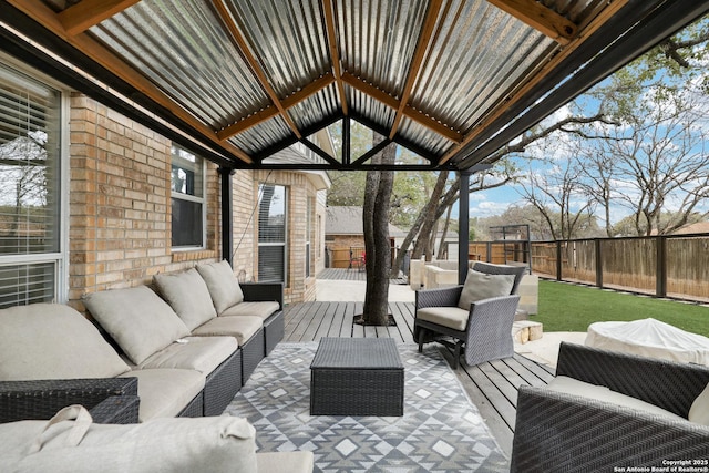 wooden deck with outdoor lounge area