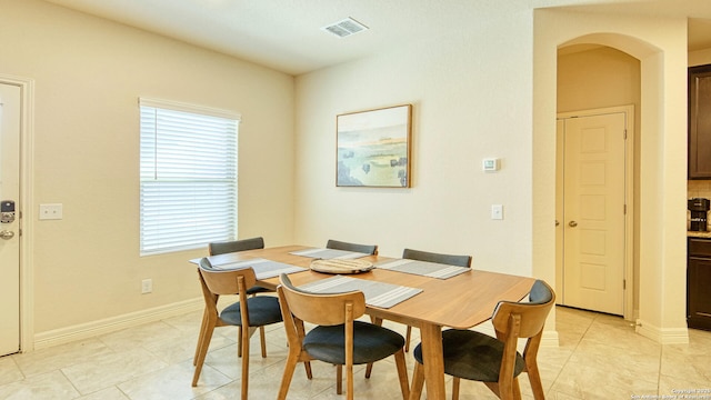 view of tiled dining room