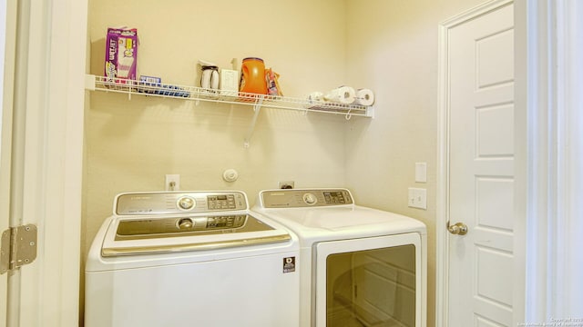 laundry area featuring separate washer and dryer