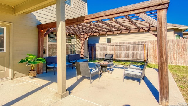 view of patio with a pergola and an outdoor living space with a fire pit