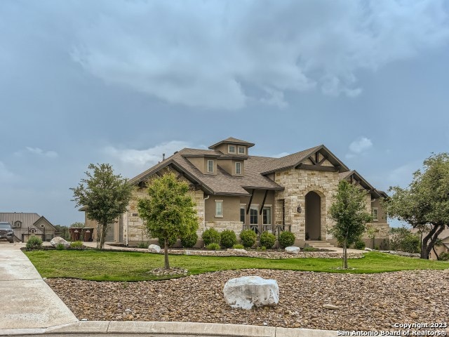 view of front of property with a front lawn