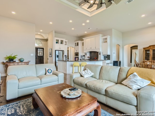 living room with ceiling fan