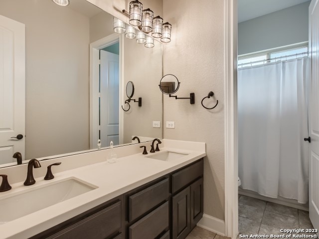 bathroom featuring vanity and tile patterned floors