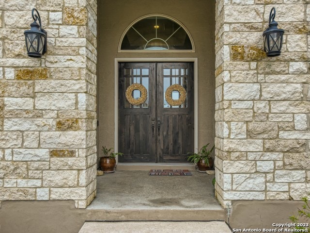 doorway to property with french doors