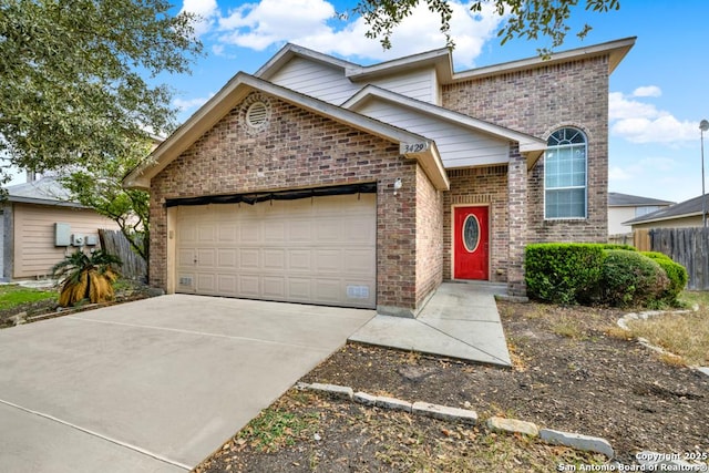 view of front of property with a garage