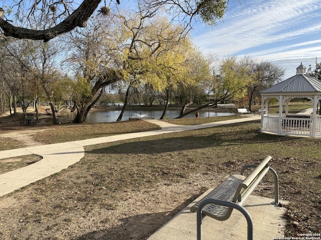 view of home's community featuring a gazebo and a water view