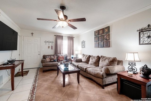 living room featuring a textured ceiling, ceiling fan, light tile patterned floors, and crown molding