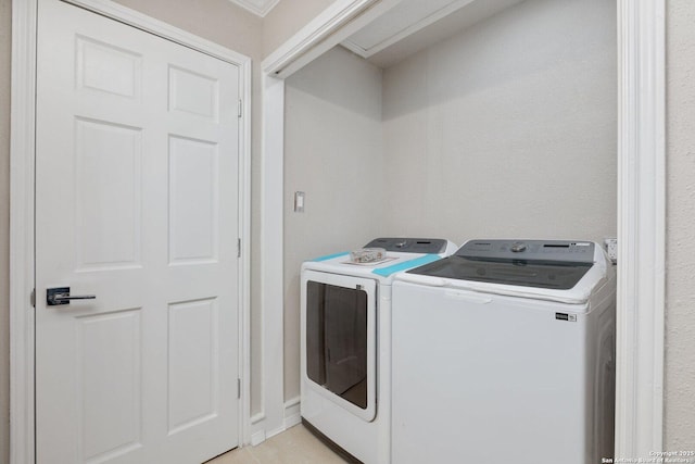 laundry area with washing machine and dryer