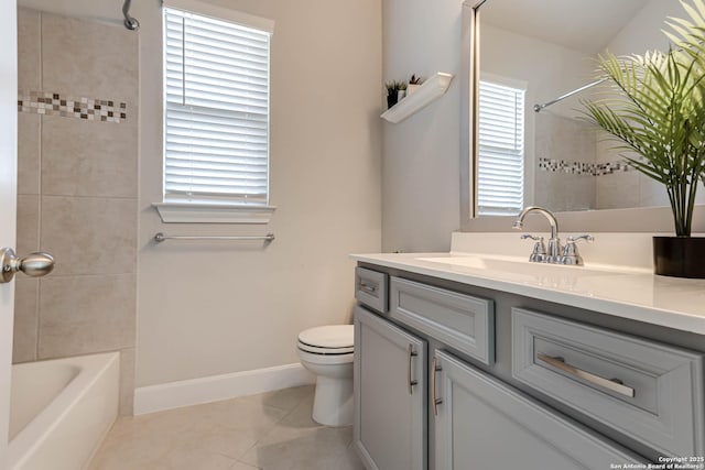 full bathroom with tile patterned floors, vanity, toilet, and tiled shower / bath