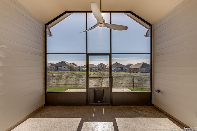 sunroom / solarium with vaulted ceiling