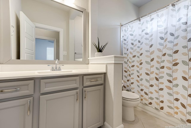 full bathroom featuring tile patterned floors, vanity, shower / tub combo, and toilet