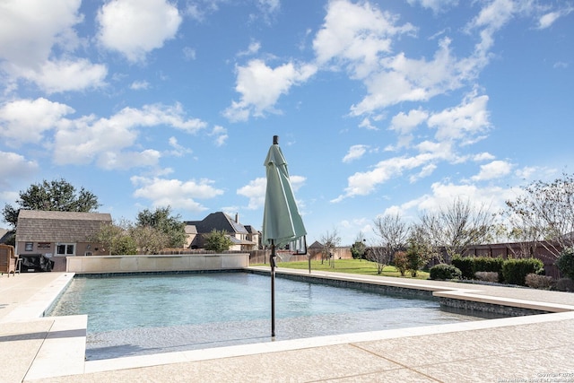 view of pool featuring an outdoor structure