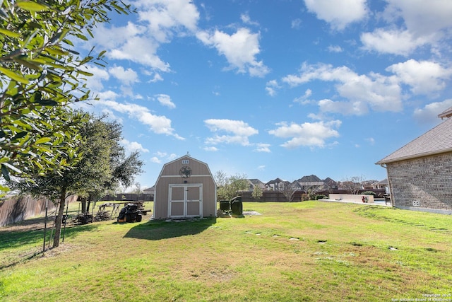 view of yard featuring a storage unit