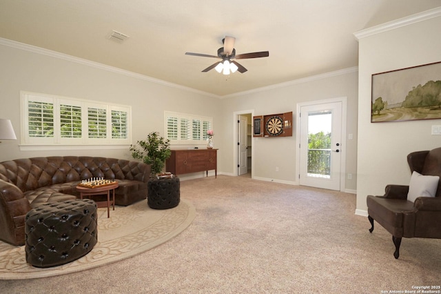 604 Hannahs Run, New Braunfels, TX 78130 - living area featuring a ceiling fan, crown molding, carpet, and baseboards