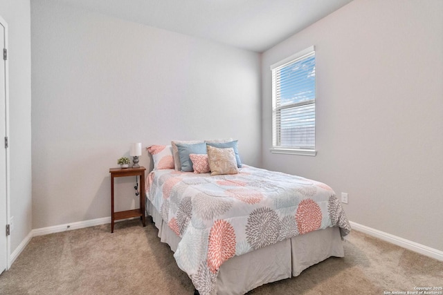 bedroom featuring carpet